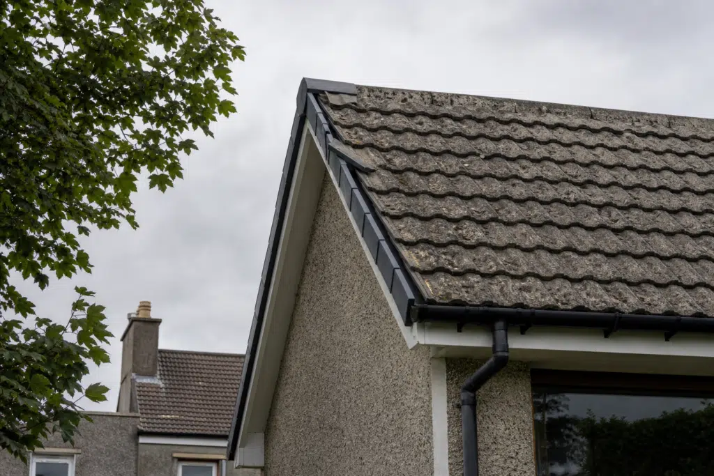 Tiled house roof in St Andrews with a dry verge system along the gable edge
