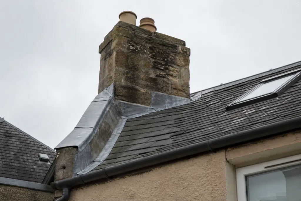 Residential roof chimney and surrounding leadwork on a Scottish home in Dunfermline